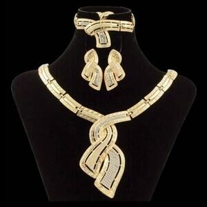 Gold Tone and Clear Stones Necklace, Bracelet, Earrings, and Adjustable Ring Set